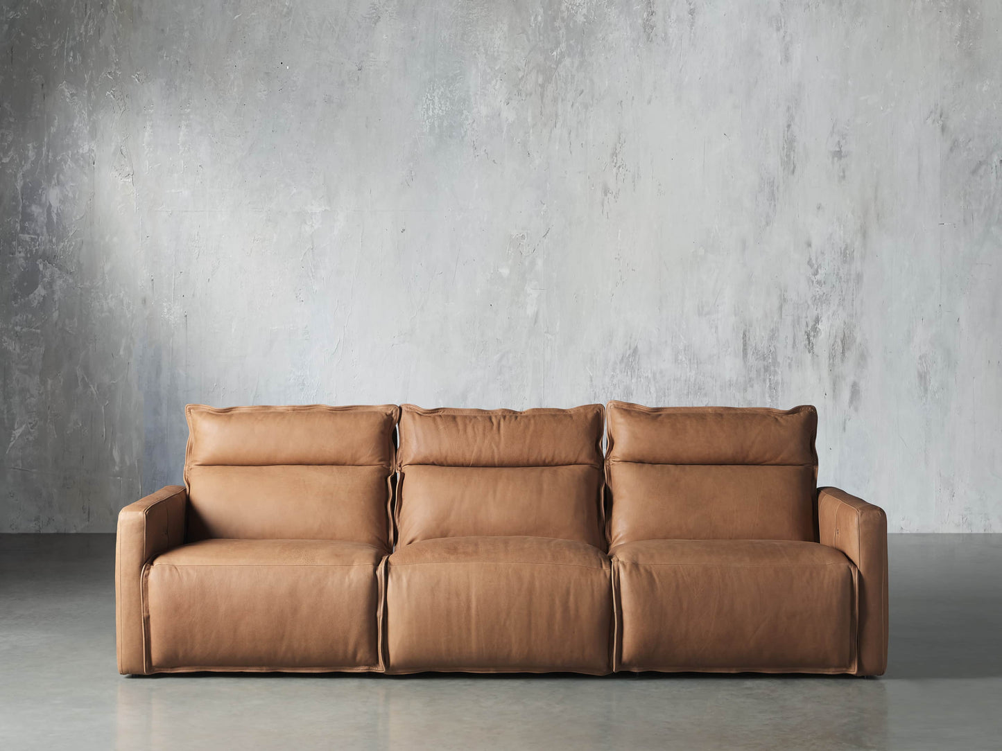 Rowland Leather Three-Piece Motion Modular Sofa