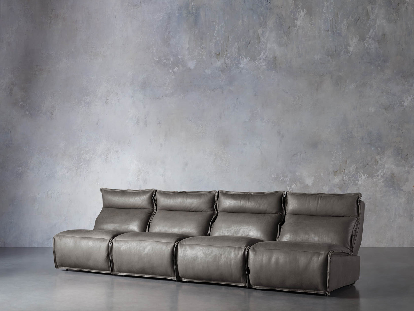 Rowland Leather Four-Piece Armless Motion Modular Sofa