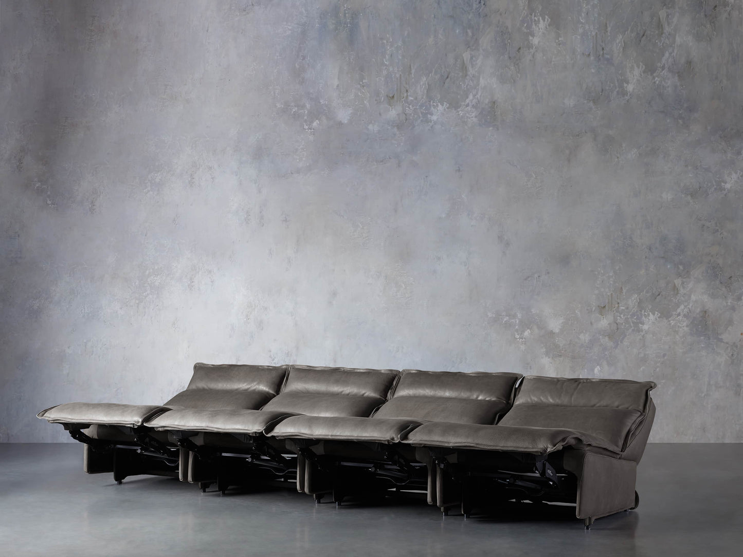 Rowland Leather Four-Piece Armless Motion Modular Sofa