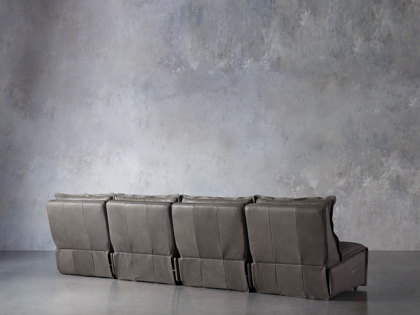 Rowland Leather Four-Piece Armless Motion Modular Sofa