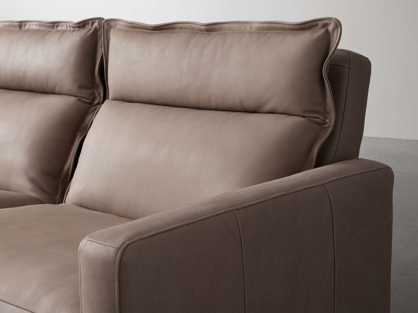 Rowland Leather Three-Piece Motion Modular Sofa