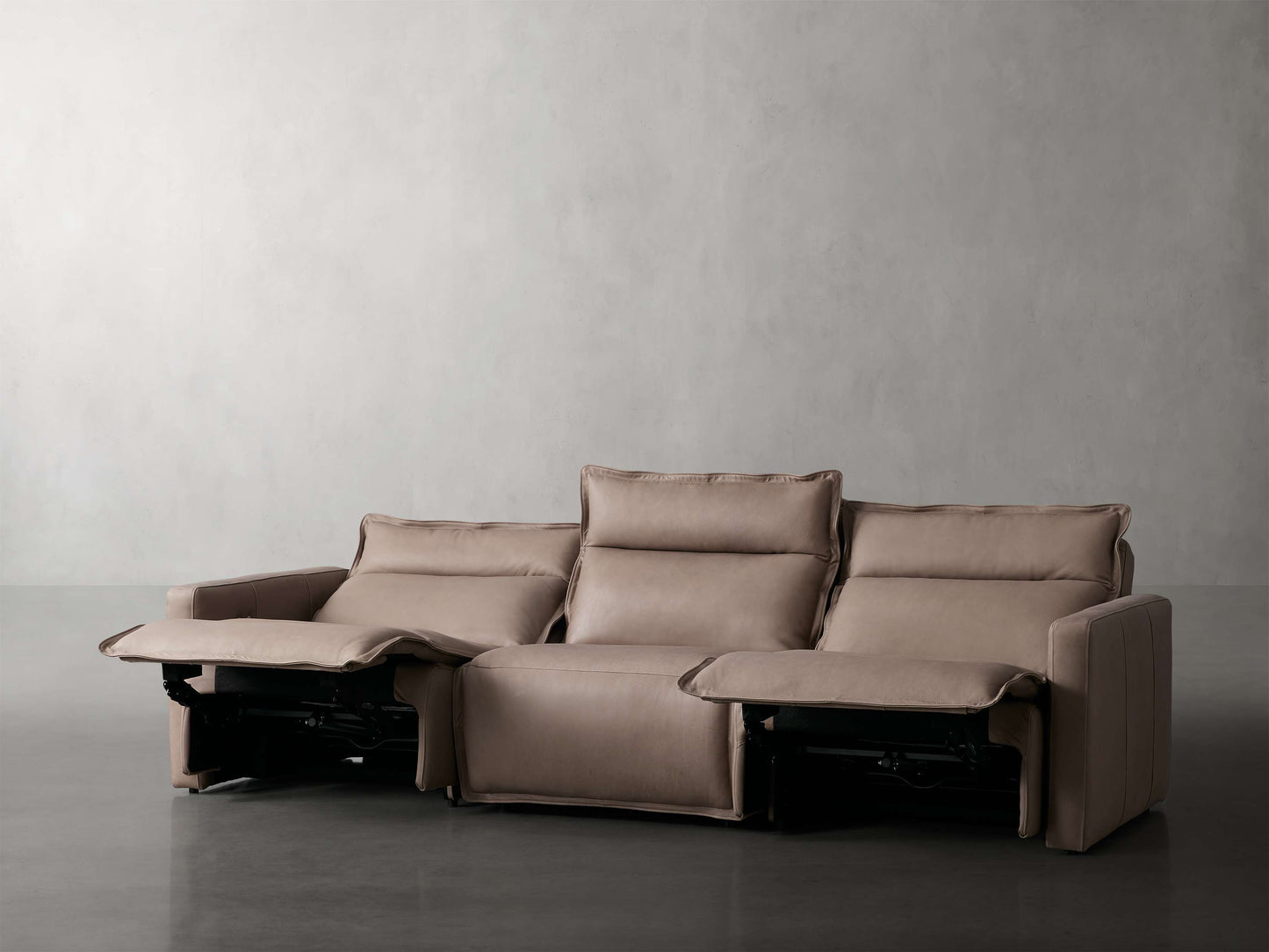 Rowland Leather Three-Piece Motion Modular Sofa