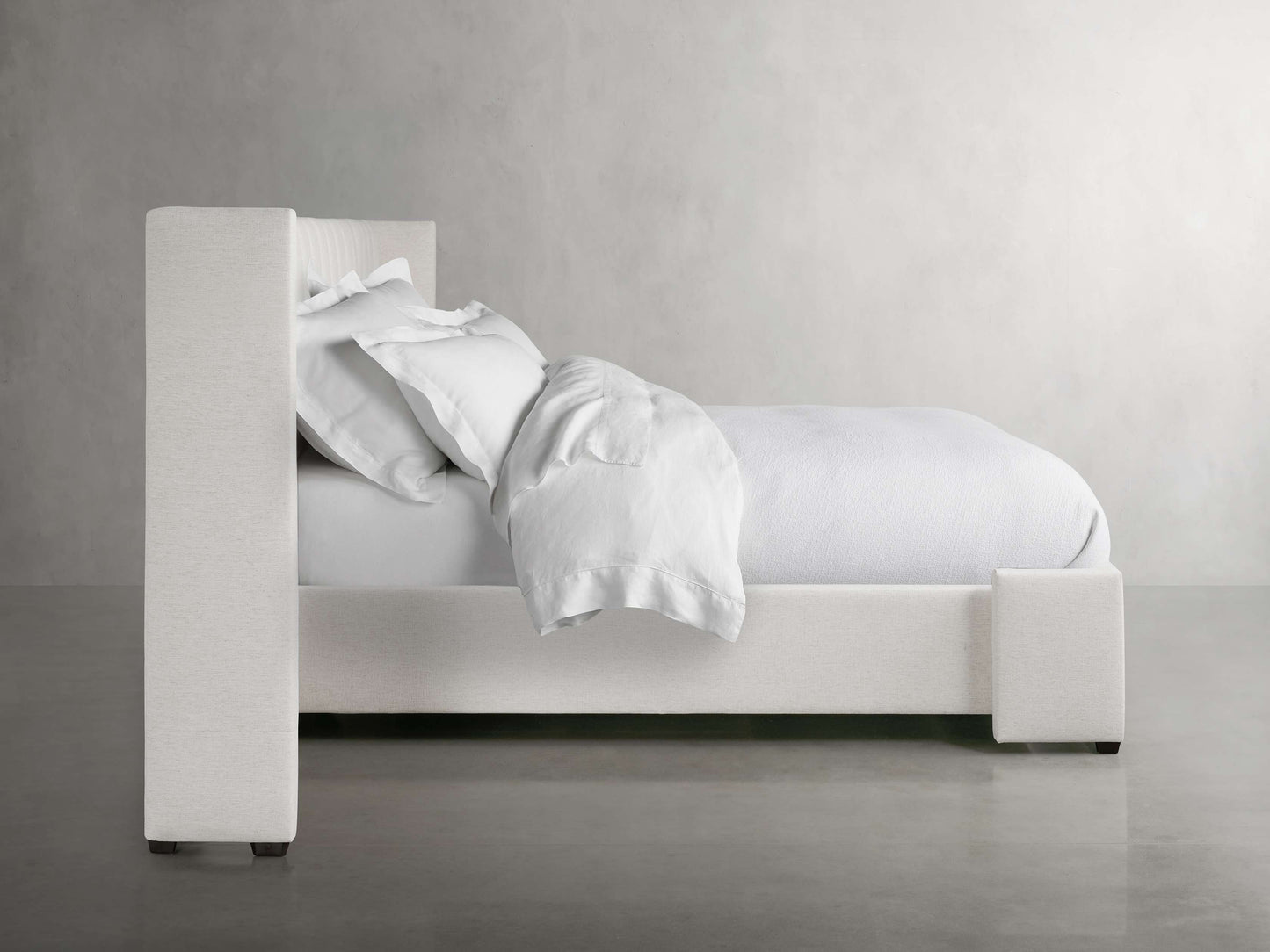 Wyller Channel-Stitched Extended Headboard Bed with Low Footboard