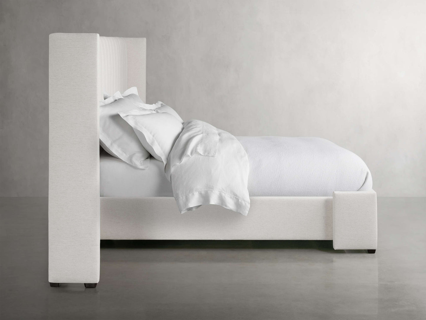 Wyller Channel-Stitched Extended Headboard Bed with Low Footboard